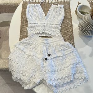 20%dsc*** Sandro Paris beach set bra top and skort in size xs/s